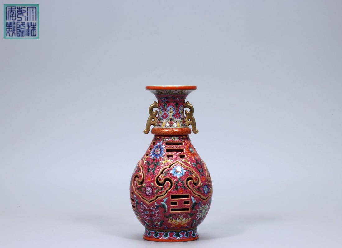 A Exquisite Ruby Red-Glazed Flower Pattern Double-Ears Vase: A Exquisite Ruby Red-Glazed Flower Pattern Double-Ears Vase,Qing Dynasty, China,Qianlong Six-character Mark,Size:7.5inx4.3inx2.6in ,Weight:760g 胭脂红花卉纹双