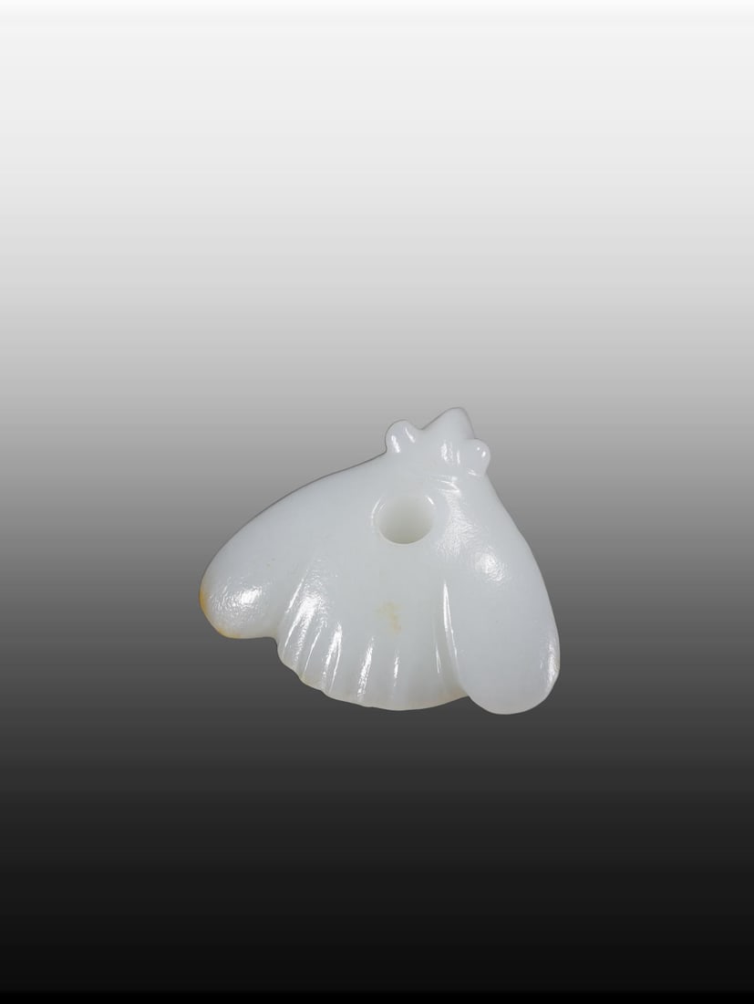 A Exquisite Hotan Jade Cicada Ornament: A Exquisite Hotan Jade Cicada Ornament,Qing Dynasty, China,Size:1.7inx1.4inx0.7in,Weight:19.5g 和田玉蝉摆件,中国清代