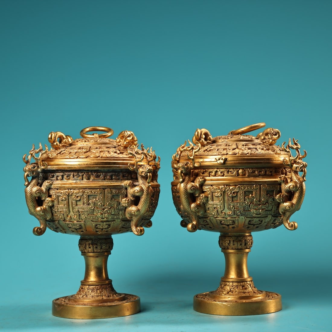 A pair of Exquisite Gilt Bronze Dragon-Ears Jar: A pair of Exquisite Gilt Bronze Dragon-Ears Jar,Qing Dynasty, China,Size:5.9inx5.3in,Weigh:1100g 一对铜鎏金龙耳罐,中国清代
