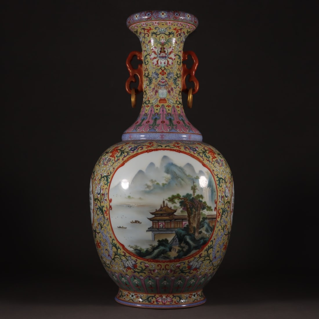 A Exquisite Yellow Ground Landscape Pattern Double-Ears Vase: A Exquisite Yellow Ground Landscape Pattern Double-Ears Vase,Qing Dynasty, China,Qianlong Four-character Mark,Size:21.3inx4.5inx6.9in 黄地山水纹双耳瓶,&