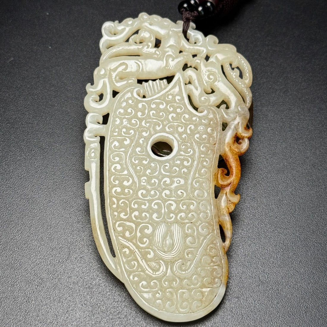 A Exquisite Hotan Jade Dragon Phoenix Pattern Bi: A Exquisite Hotan Jade Dragon Phoenix Pattern Bi,Han Dynasty, China,Size:4.7inx2.5inx0.2in, Weight:79g 和田玉龙凤纹玉璧,中国汉代