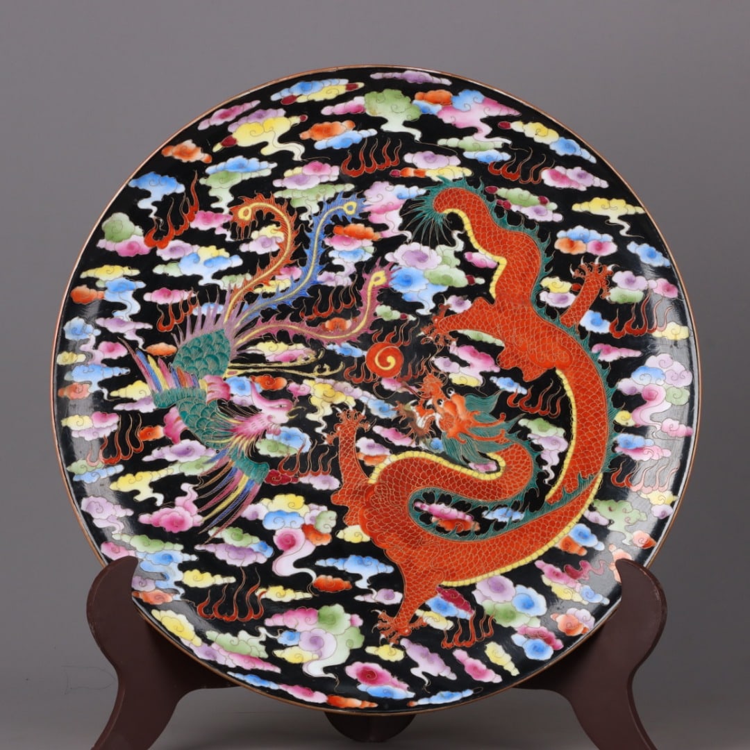 A Exquisite Enamel Black Ground Gilt Dragon and Phoenix Pattern Plate: A Exquisite Enamel Black Ground Gilt Dragon and Phoenix Pattern Plate,Qing Dynasty, China,Qianlong Six-character Mark,Size:2inx16.3in 珐琅彩黑地鎏金龙&#