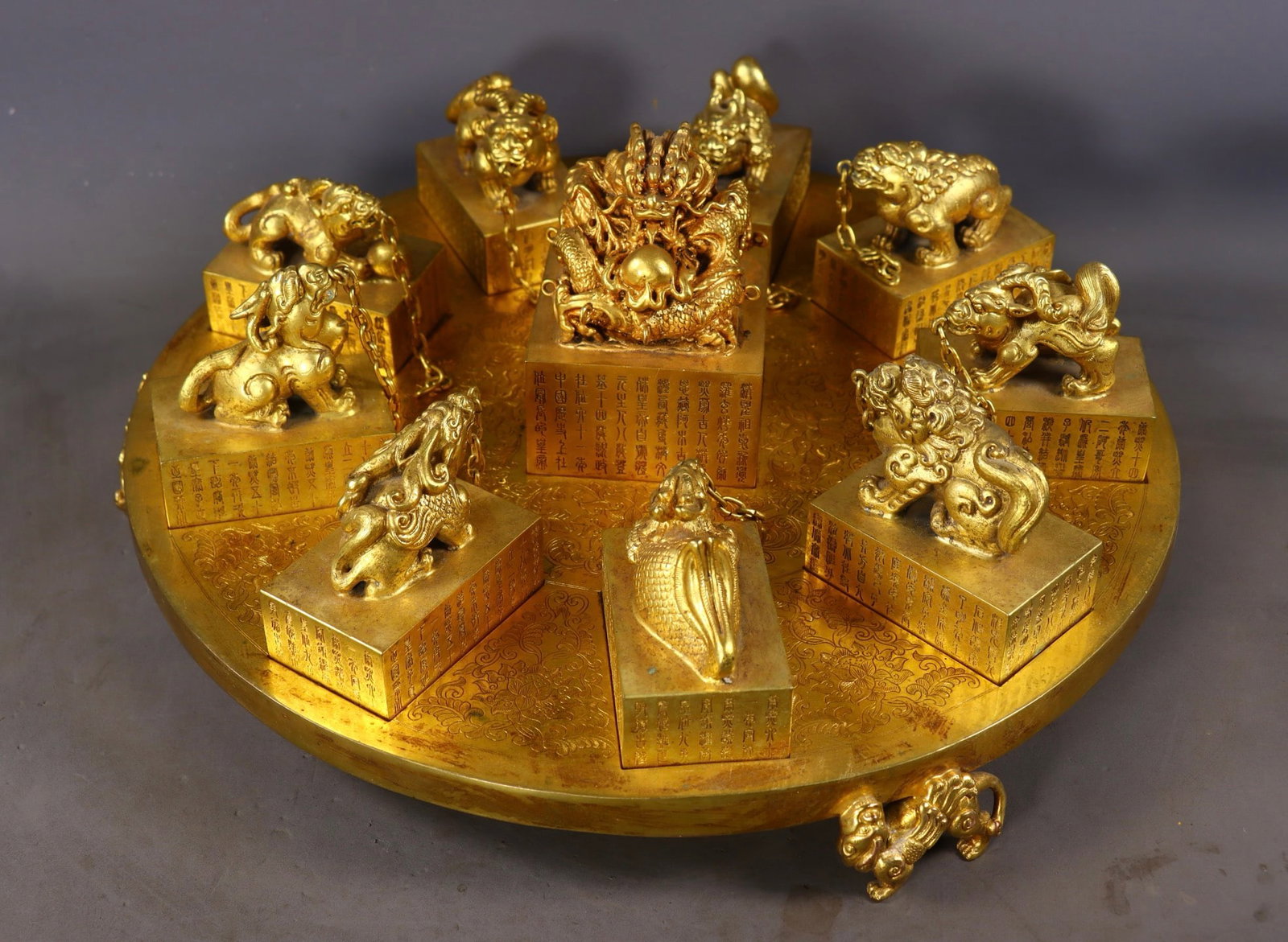 A Set of Rare Gilt Bronze Beast-Shaped Seals,With Poem: A Set of Rare Gilt Bronze Beast-Shaped Seals,With Poem,Qing Dynasty,China,Size:(Total)6.3in,(Base)2inx15.6in,(large)4.5inx3.1in,(Small)3.3inx3.1inx2in,Total