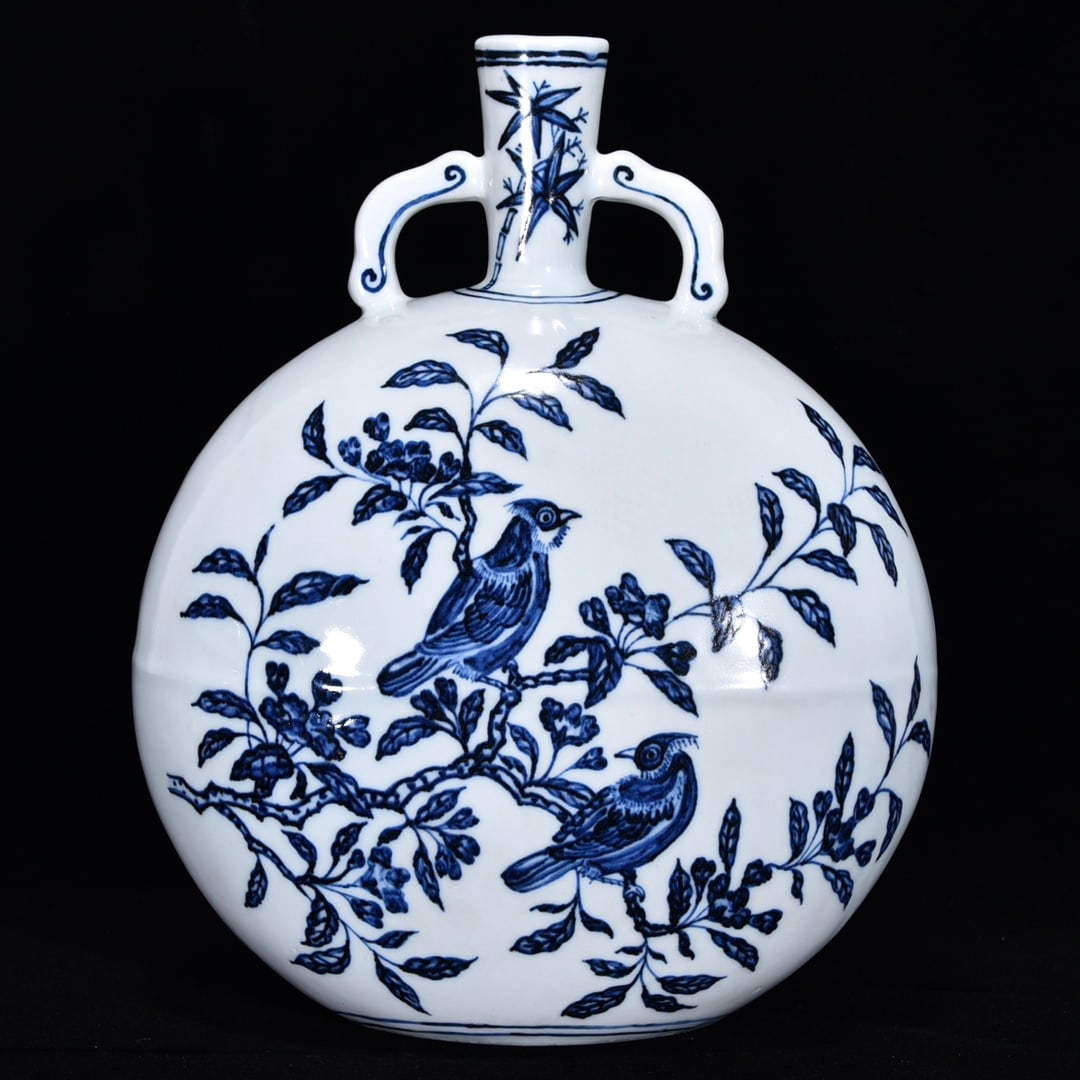 An Exquisite Blue and White Flower and Bird Pattern Double-Ears Vase: An Exquisite Blue and White Flower and Bird Pattern Double-Ears Vase Ming Dynasty, China Xuande Six-character Mark Size:12.6inx10.2in青花花鸟纹扁瓶 中&#