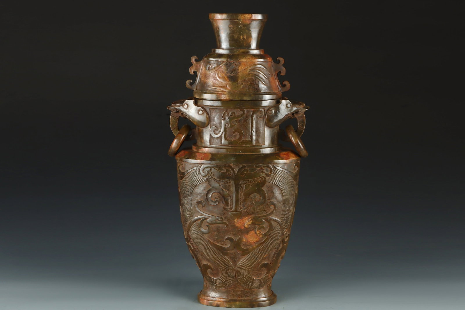 A Huge Hotan Jade Phoenix Pattern Double-Ears Vase: A Huge Hotan Jade Phoenix Pattern Double-Ears Vase,the Warring States period in China,Size:18.9inx8.7in,Weight:5637g和田玉凤纹双耳瓶,中国