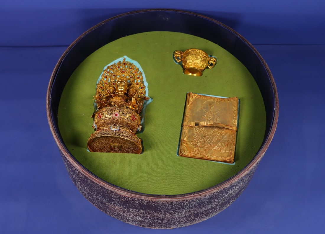 An Exquisite Filigree and Gilding Inlaid Gems Buddha Statue,With Scriptures: An Exquisite Filigree and Gilding Inlaid Gems Buddha Statue,With Scriptures,Qing Dynasty,China,Qianlong Four-character Mark,Size:(Buddha Statue)9.8in,(Base)4.3in,(Cup)2.4inx3.9inx2.4in,(Scriptures)76.