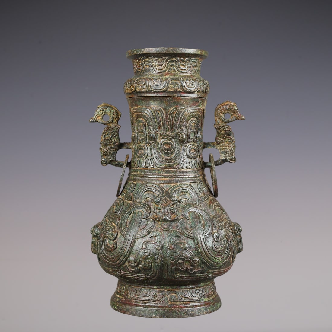 An Archaic Bronze Dragon Pattern Beast-Ears Vase,With Inscription: An Archaic Bronze Dragon Pattern Beast-Ears Vase,With Inscription,W.Zhou ,China,Size:7.1inx11.8in,Weight:3900g青铜龙纹兽耳瓶,带铭文,中
