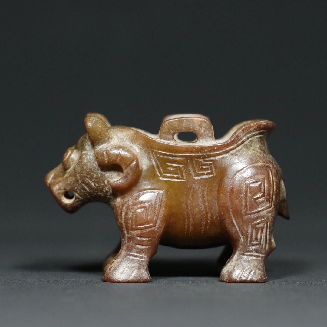 An Exquisite White Jade Buffalo-Shaped Libation Cup (1 of 9)