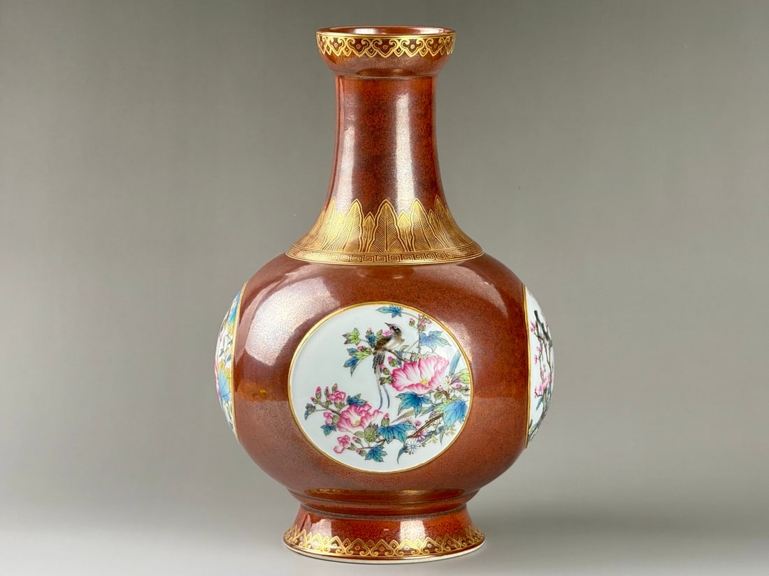 An Exquisite Red Ground Famille-Rose Painted Gold Flower and Bird Pattern Vase: An Exquisite Red Ground Famille-Rose Painted Gold Flower and Bird Pattern Vase,Qing Dynasty,China,Qianlong Six-character Mark,Size:11.3inx7.3inx4.4in红地粉彩描金