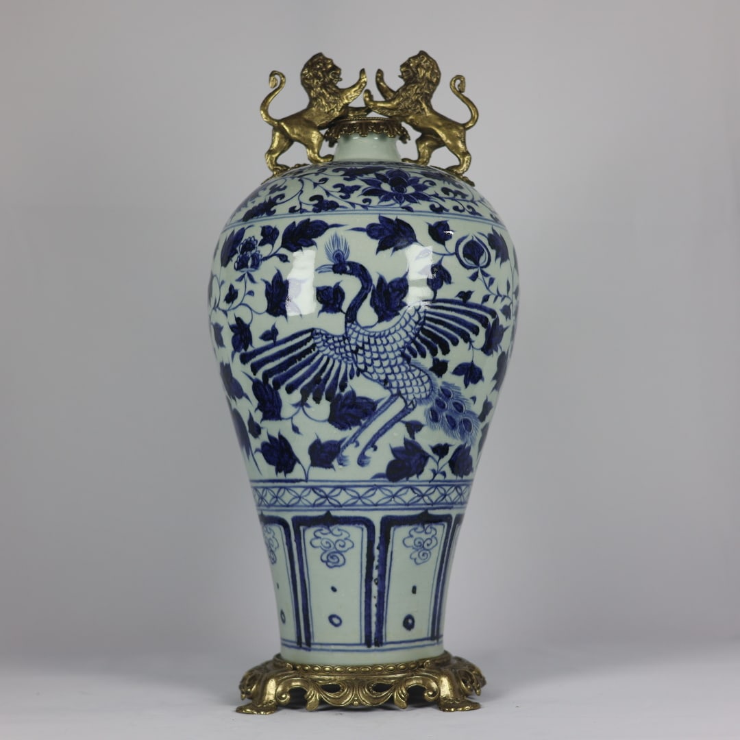 A Huge Blue and White Inlaid Bronze Lotus and Phoenix Pattern Lion-Ears Vase: A Huge Blue and White Inlaid Bronze Lotus and Phoenix Pattern Lion-Ears Vase,Yuan Dynasty,China,Size:21.3inx9.1inx7.7in青花镶铜缠枝莲凤纹狮&