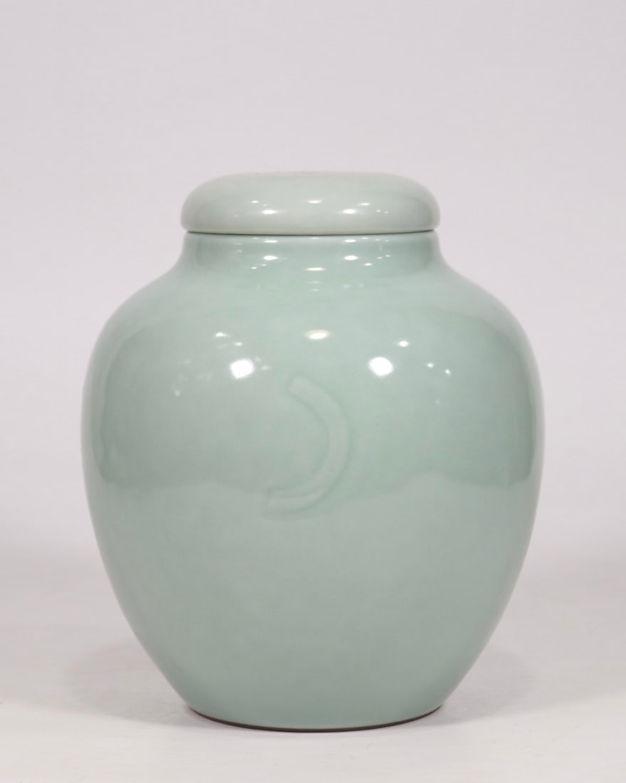 An Exquisite Celadon Glazed Cover Jar (1 of 6)