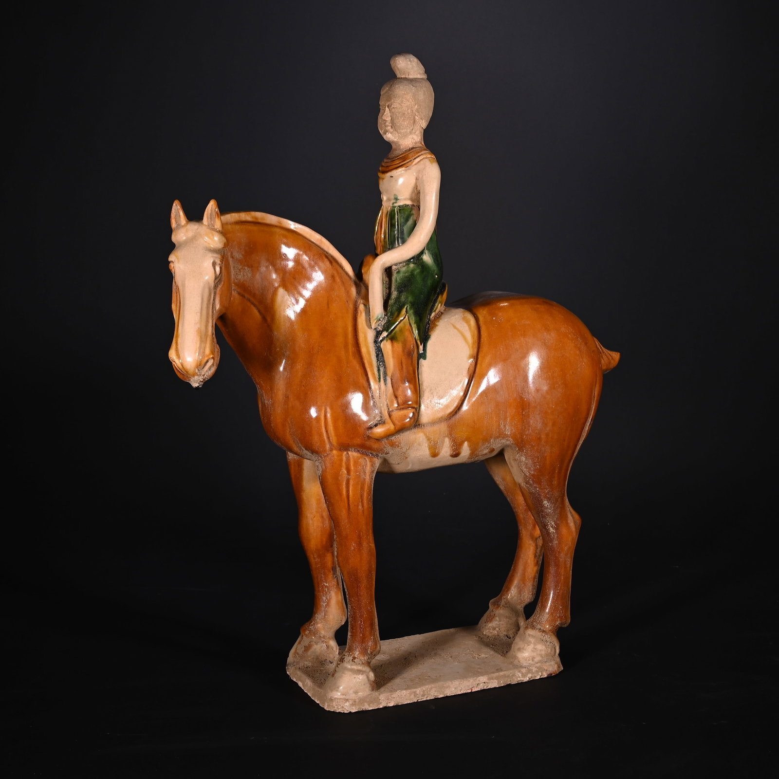 A Huge Tang Tri-Color Glazed Pottery Figure Riding Horse Ornament: A Huge Tang Tri-Color Glazed Pottery Figure Riding Horse Ornament,Tang Dynasty, China,Size:16.9inx14.2inx4.3in,Weight:2900g唐三彩人物骑马摆件,