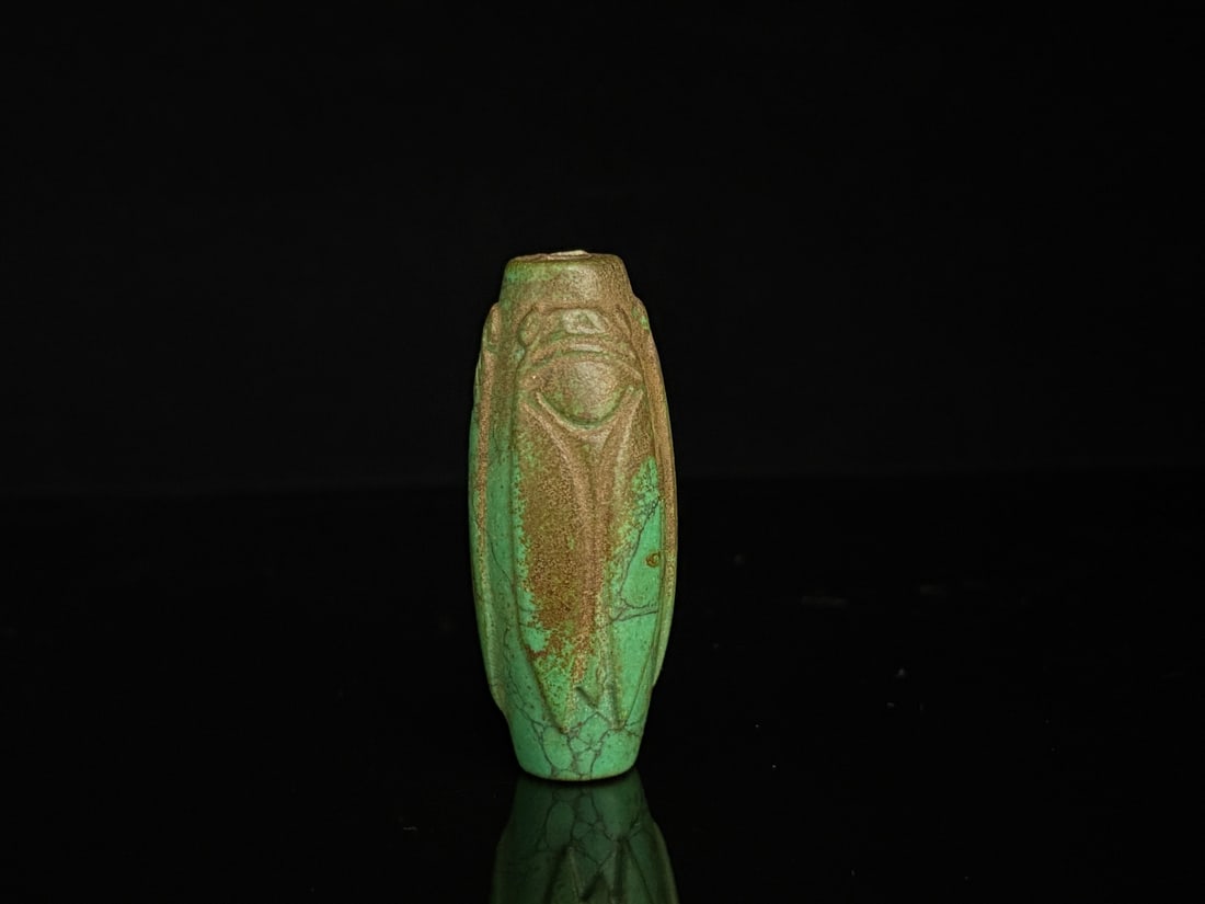An Exquisite Turquoise Cicada Pattern Pendant: An Exquisite Turquoise Cicada Pattern Pendant,Qing Dynasty,China,Size:2.5inx1in,Weight:46g绿松石蝉纹挂件,中国清代,Size:6.3cmx2.5cm,Wei