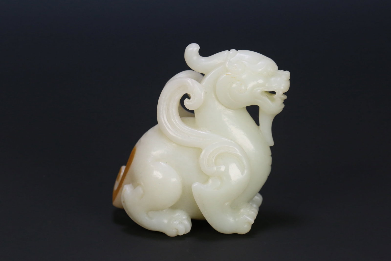 An Exquisite White Jade Auspicious Beast Ornament (1 of 9)