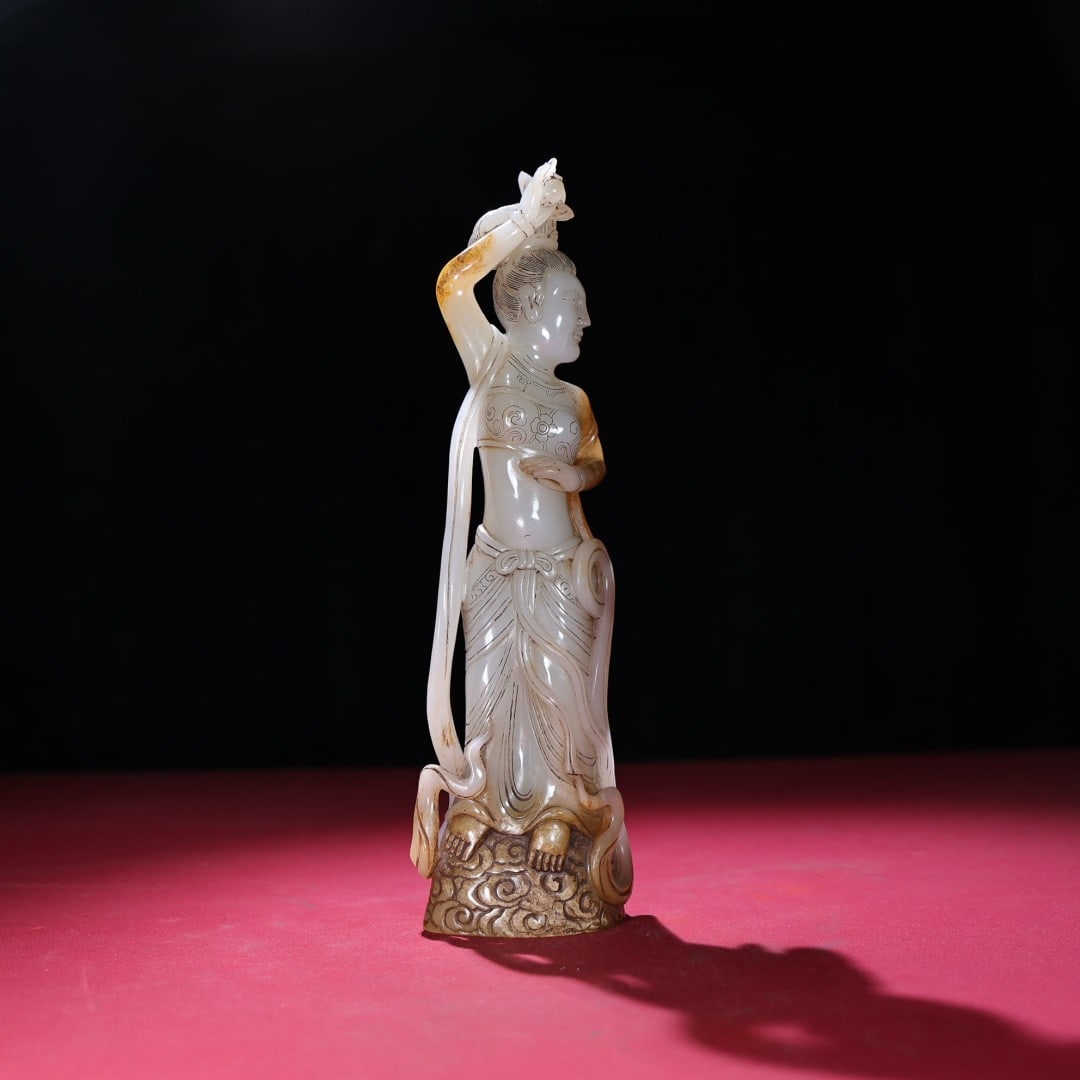 An Exquisite White Jade Figure Ornament: An Exquisite White Jade Figure Ornament,Qing Dynasty,China,Size:10.7inx3.2inx2.2in,Weight:999g白玉人物摆件,中国清代,Size:27.1cmx8.1cmx5.6cm,