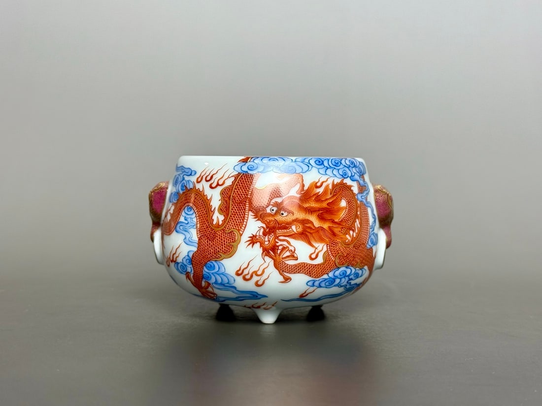 An Exquisite Blue and White Iron-Red Glazed Painted Gold Auspicious Cloud,Dragon and Phoenix Pattern: An Exquisite Blue and White Iron-Red Glazed Painted Gold Auspicious Cloud,Dragon and Phoenix Pattern Beast-Ears Tripod Censer,Qing Dynasty,China,Qianlong Four-character Mark,Size:2.4inx3.7inx1.7in&
