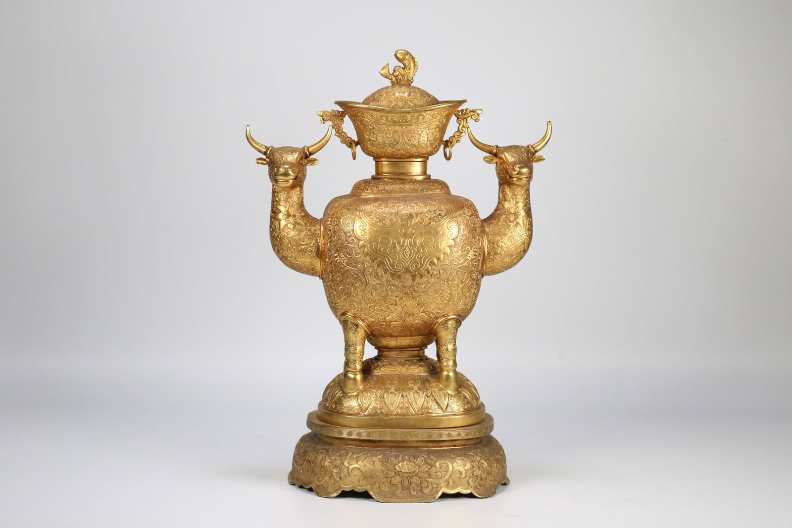 A Huge Gilt Bronze Lotus and Beast-Face Pattern Sheep-Ears Vase: A Huge Gilt Bronze Lotus and Beast-Face Pattern Sheep-Ears Vase,Qing Dynasty, ChinaSize:16.5inx11.4inx7.1in铜鎏金缠枝莲兽面纹羊耳ī