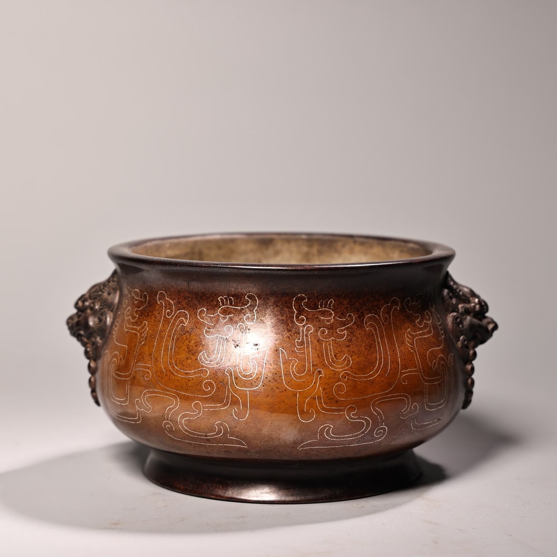 An Exquisite Bronze Inlaid Silver Chi-Dragon Pattern Lion-Ears Censer: An Exquisite Bronze Inlaid Silver Chi-Dragon Pattern Lion-Ears Censer,Ming Dynasty, China,Xuande Six-character