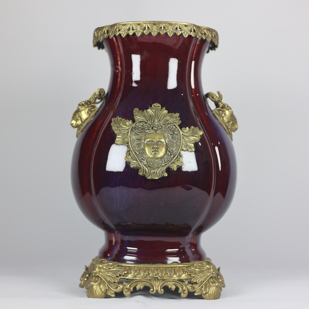 A Huge Flambe Glazed Inlaid Bronze Figure-Face Pattern Sheep-Ears Vase: A Huge Flambe Glazed Inlaid Bronze Figure-Face Pattern Sheep-Ears Vase,Qing Dynasty,China,Yongzheng Six-character Mark,Size:16.1inx10.6inx9.1in窑变釉镶铜人面&