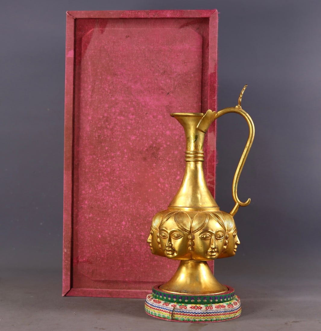 An Exquisite Gilt Bronze Figure-Face Pattern Ewer: An Exquisite Gilt Bronze Figure-Face Pattern Ewer,Qing