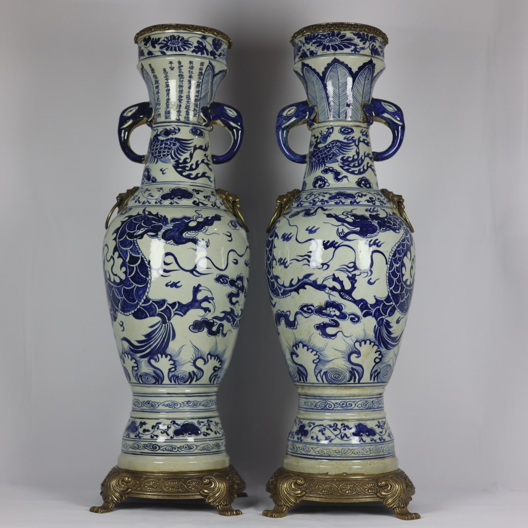 A Pair of Huge Blue and White Inlaid Bronze Auspicious Cloud,Dragon and Phoenix Pattern: A Pair of Huge Blue and White Inlaid Bronze Auspicious Cloud,Dragon and Phoenix Pattern Elephant-Ears Vases,With Poem,Yuan Dynasty,China,Size:27.6inx8.7inx9.1in一对青花镶