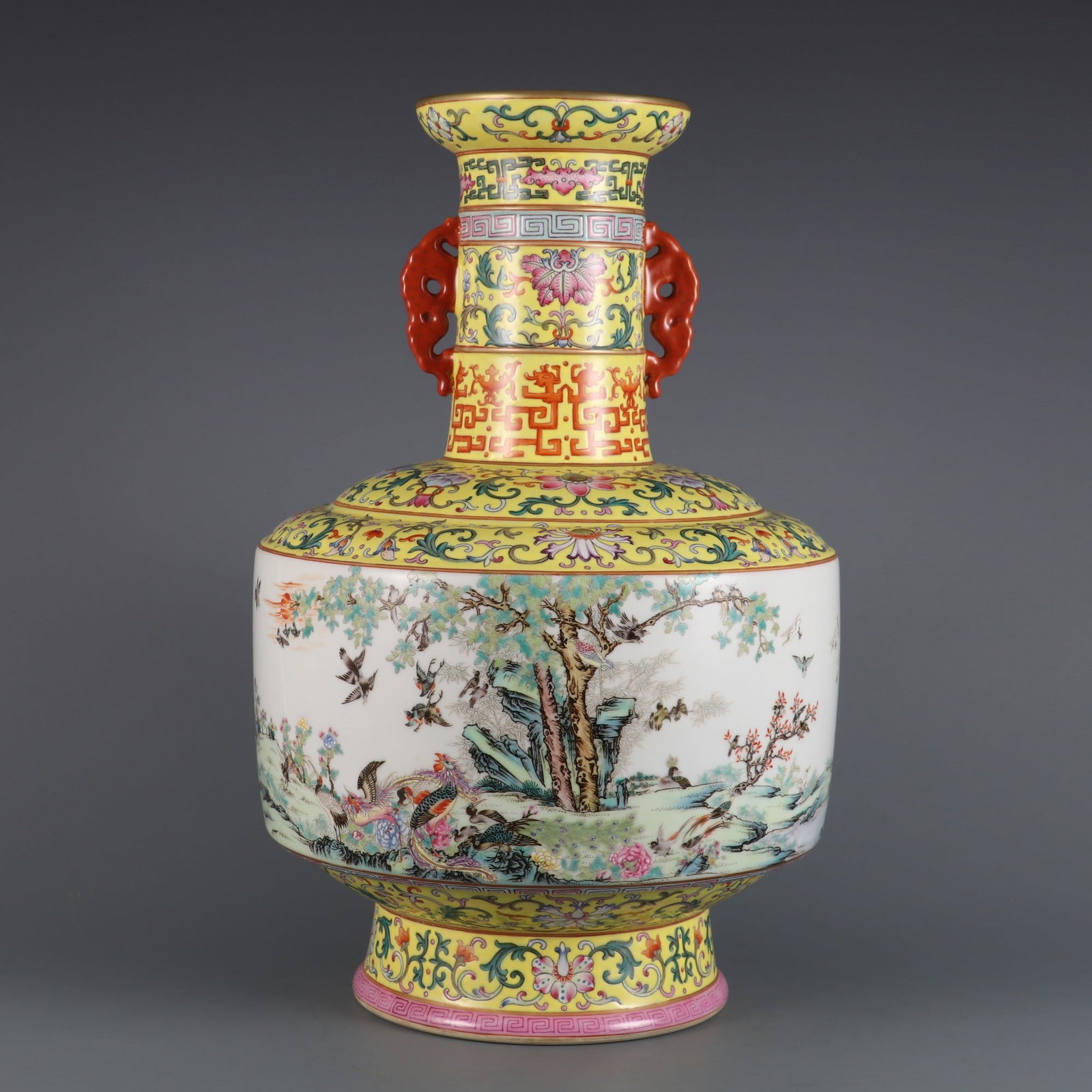 A Rare Famille-Rose Lotus Pattern Flower and Bird Pattern Double-Ears Vase: A Rare Famille-Rose Lotus Pattern Flower and Bird Pattern Double-Ears Vase Qing Dynasty, China Qianlong Six-character MarkSize:14.9inx9.4in粉彩缠枝莲纹花Ɣ