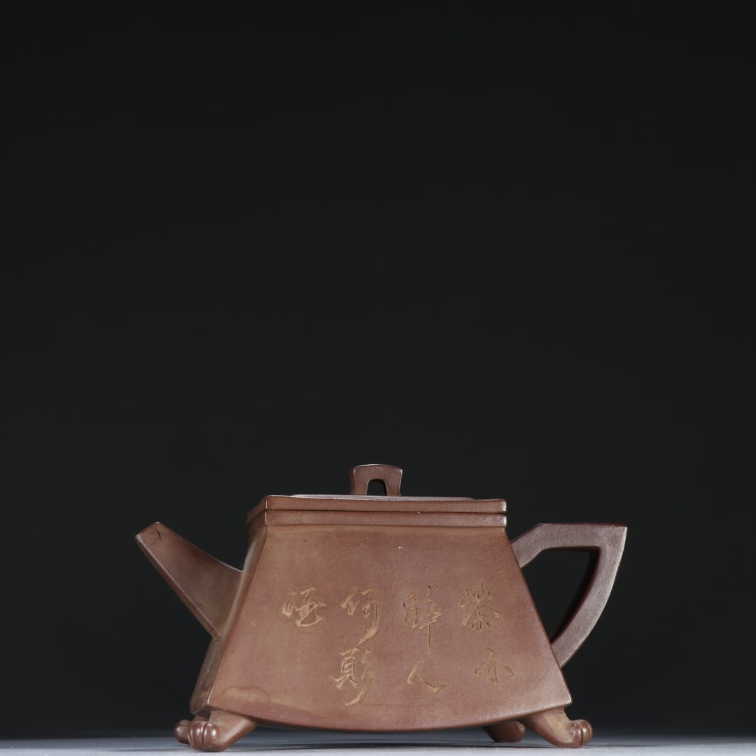 An Exquisite Purple Sands with poem Teapot: An Exquisite Purple Sands with poem Teapot Qing Dynasty, China Size:3.5inx6.2in紫砂四足方壶 中国清代 Size:9cmx15.8cm