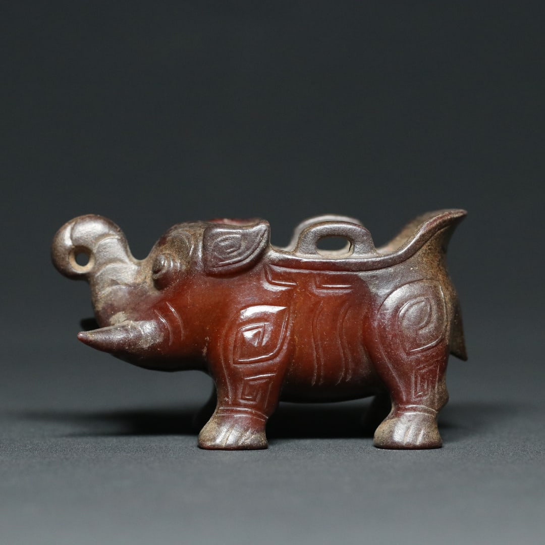 An Exquisite White Jade Elephant-Shaped Libation Cup (1 of 9)
