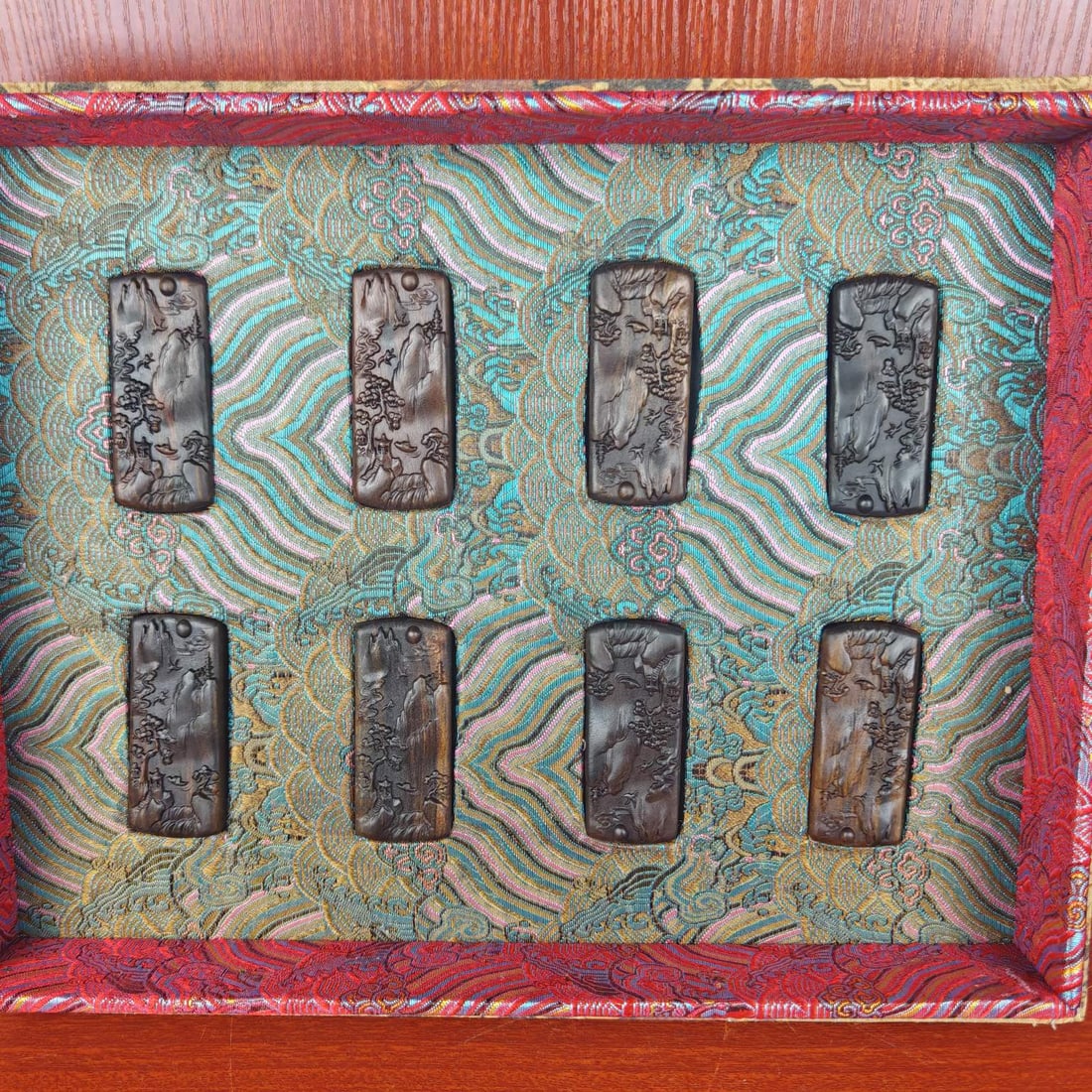 A Set of Fine Eaglewood Landscape Pattern Pendants (1 of 9)