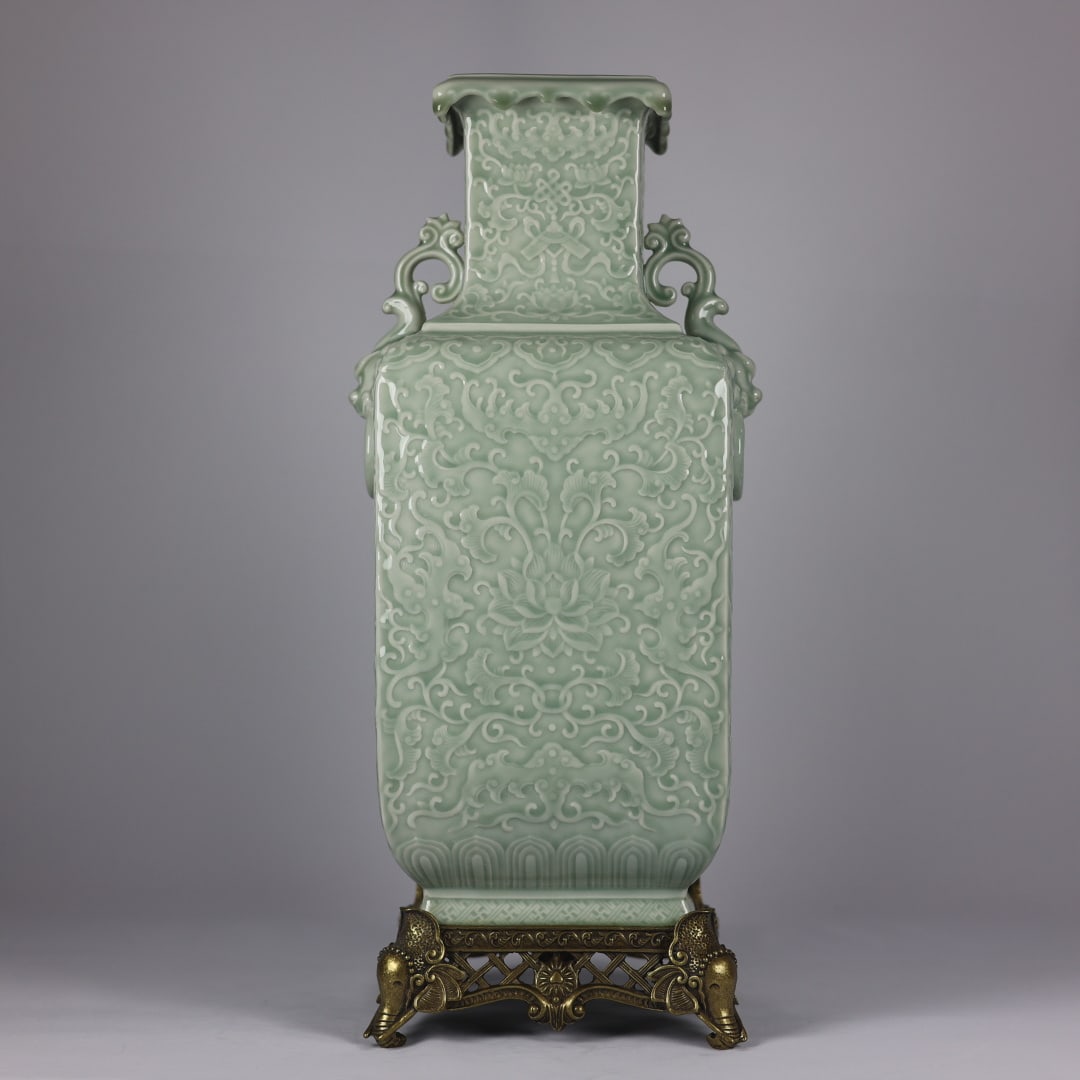 A Huge Celadon Glazed Inlaid Bronze Lotus Pattern Double-Ears Vase: A Huge Celadon Glazed Inlaid Bronze Lotus Pattern Double-Ears Vase,Qing Dynasty,China,Qianlong Six-character Mark,Size:19.7inx8.7inx6.9in青釉镶铜缠枝莲纹