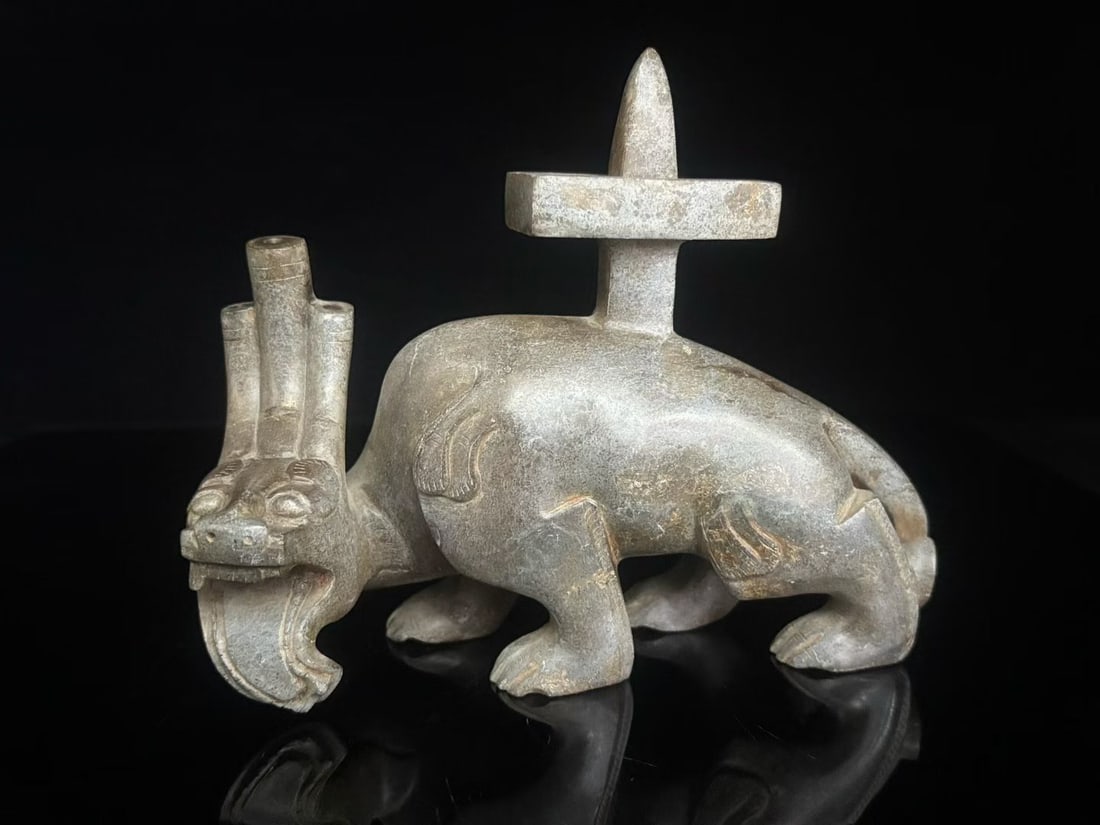 An Exquisite White Jade Auspicious Beast-Shaped Candlestick (1 of 9)