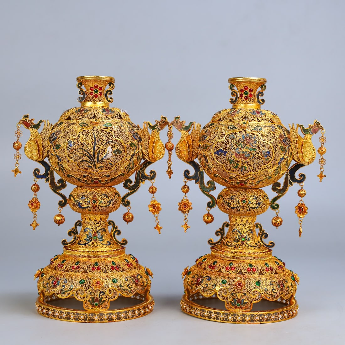 A Pair of Exquisite Filigree and Gilding Inlaid Gems Flower and Bird Pattern Phoenix-Ears Vases: A Pair of Exquisite Filigree and Gilding Inlaid Gems Flower and Bird Pattern Phoenix-Ears Vases,Qing Dynasty,China,Qianlong Four-character Mark,Size:9.4inx6.7in,Weight:1270g一对花