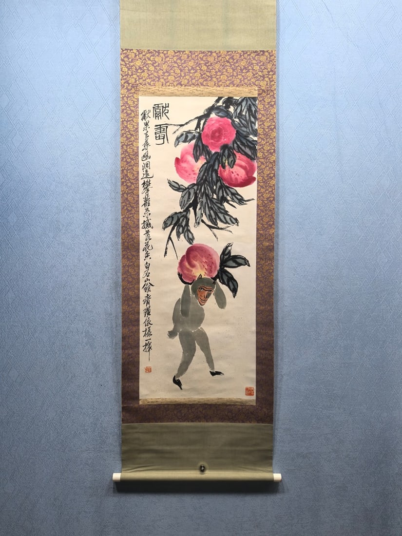 A Chinese Vertical Scroll Ink Painting of Monkey and Peach on Paper,Qi Baishi: A Chinese Vertical Scroll Ink Painting of Monkey and Peach on Paper,Qi Baishi一幅中国水墨猴桃图立轴,齐白石