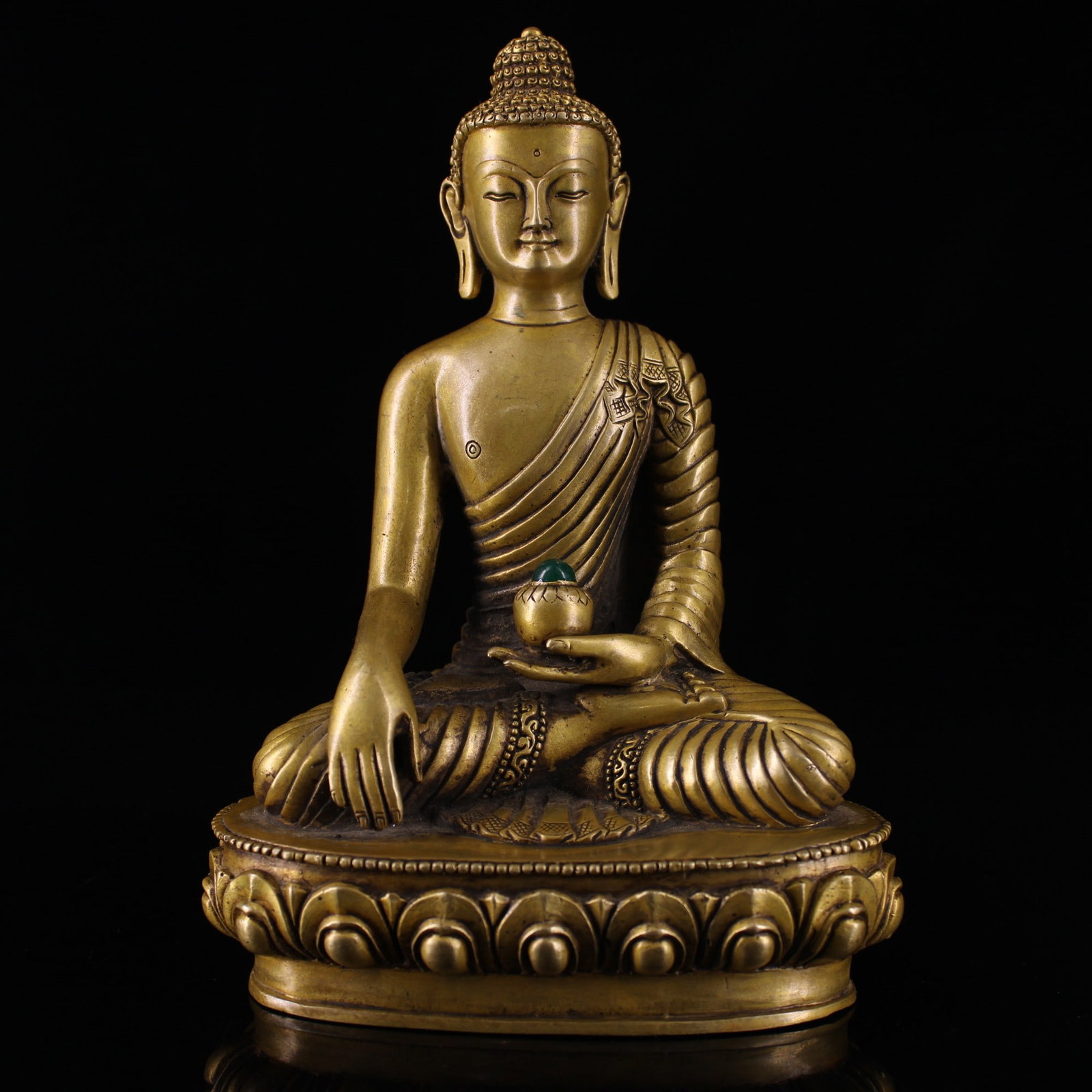 A Solemn Bronze Inlaid Gems Statue of Sakyamuni: A Solemn Bronze Inlaid Gems Statue of Sakyamuni,Qing Dynasty, China,Size:7.5inx5.1in,Weight:950g铜镶宝石释迦摩尼像,中国清代