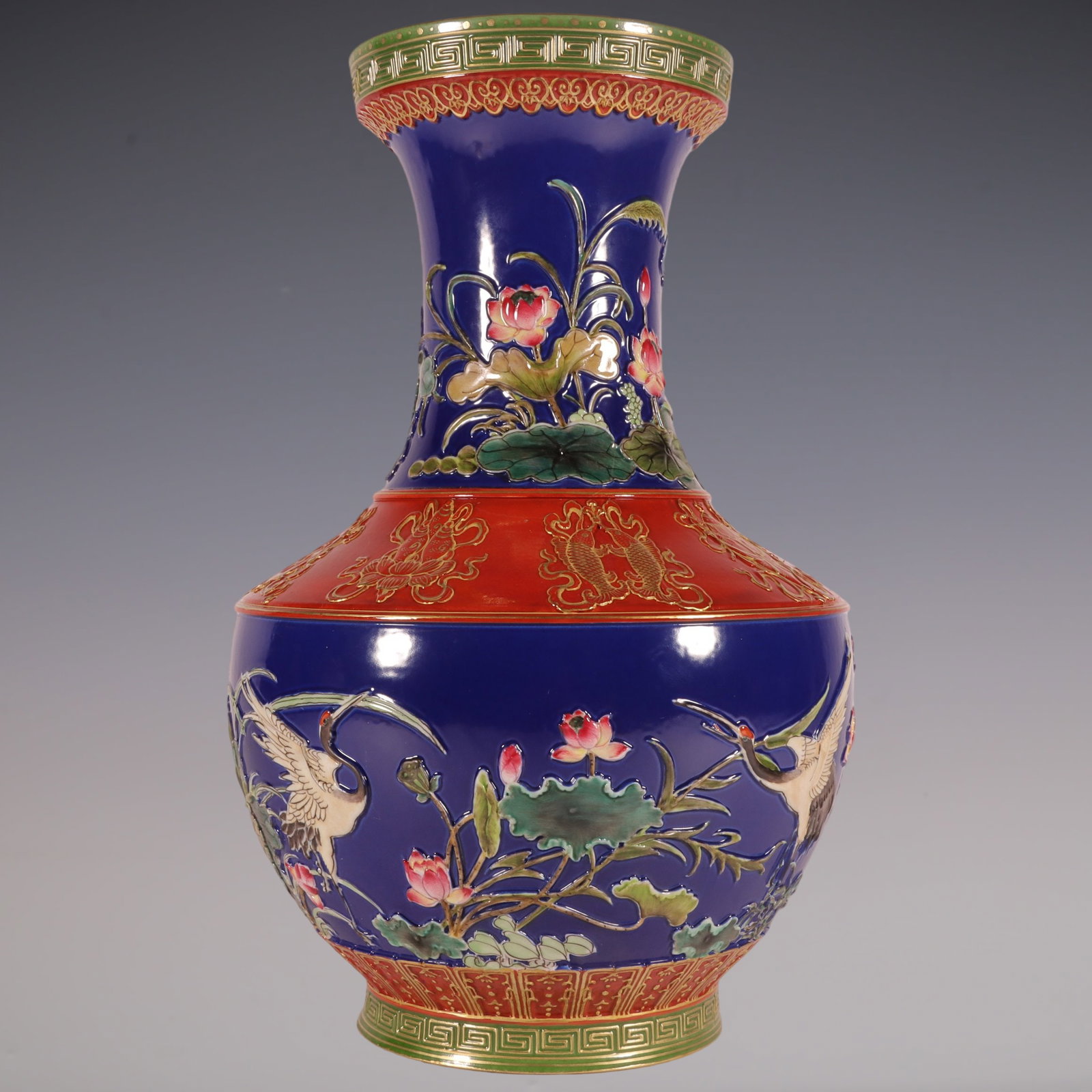 An Exquisite Enamel Ji Blue Glazed Painted Gold Flower and Bird Pattern Eight Treasures Pattern Vase: An Exquisite Enamel Ji Blue Glazed Painted Gold Flower and Bird Pattern Eight Treasures Pattern Vase Qing Dynasty, China Qianlong Six-character Mark Size:11.7inx7.1in珐琅彩霁&#