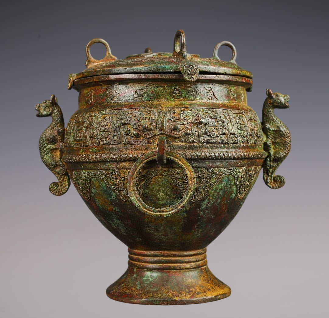 An Archaic Bronze Beast-Face Pattern Dragon-Ears Cover Jar,With Inscription: An Archaic Bronze Beast-Face Pattern Dragon-Ears Cover Jar,With Inscription,W.Zhou ,China,Size:6.7inx8.3in,Weight:2500g青铜兽面纹龙耳盖罐,带