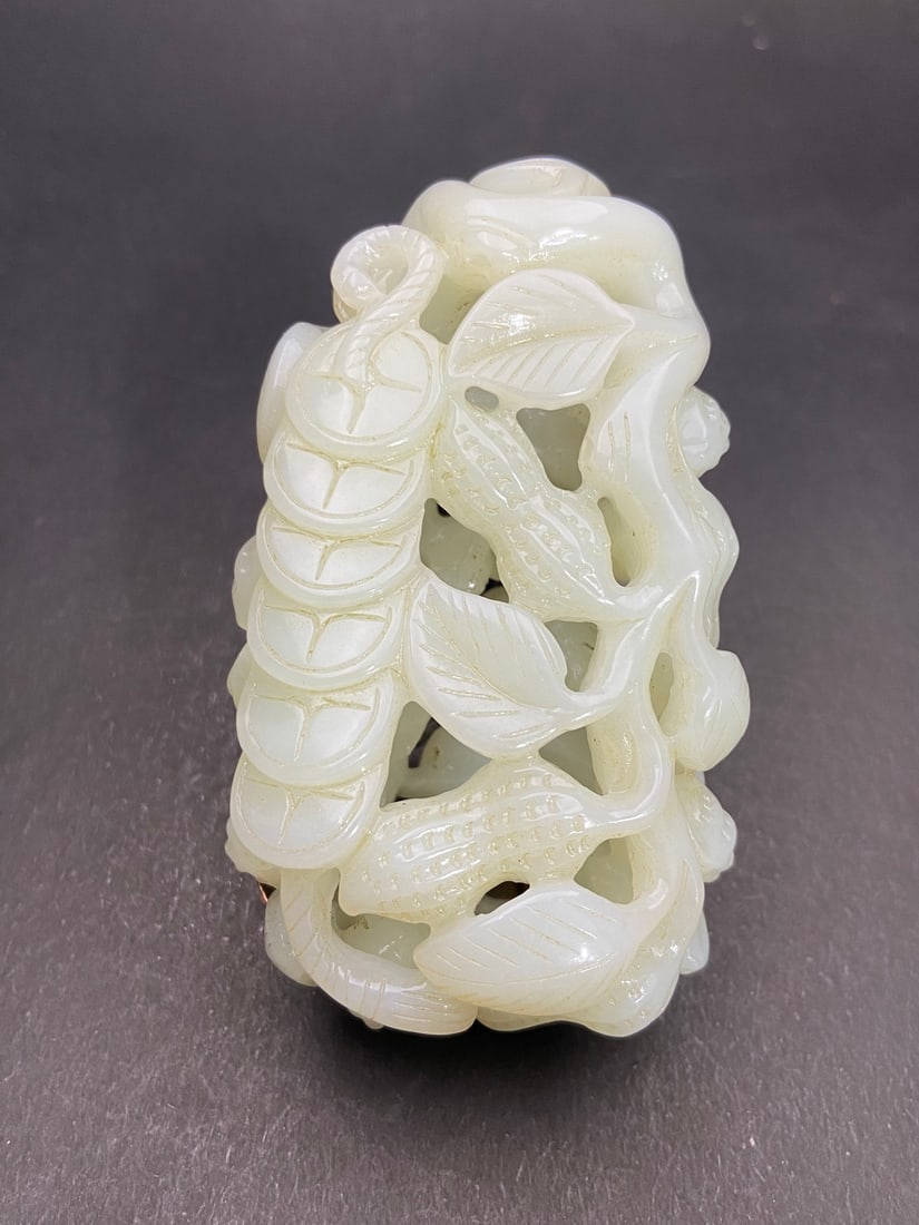 An Exquisite White Jade Cash Peanut Hand Piece (1 of 9)