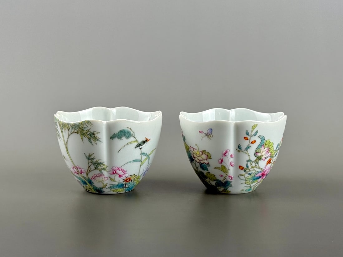 A Pair of Exquisite Famille-Rose Flower and Bird Pattern Cups: A Pair of Exquisite Famille-Rose Flower and Bird Pattern Cups,Qing Dynasty,China,Qianlong Four-character Mark,Size:3.1inx2.2inx1.4in一对粉彩花鸟纹杯,