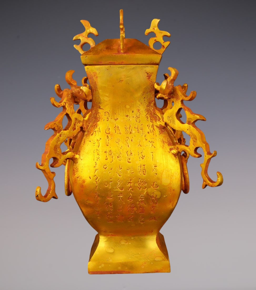 An Exquisite Gilt Bronze Inscription Dragon Pattern Beast-Ears Vase: An Exquisite Gilt Bronze Inscription Dragon Pattern Beast-Ears Vase,Han Dynasty,China,Size:7.1inx11in,Weight:2800g铜鎏金铭文龙纹兽耳瓶,È