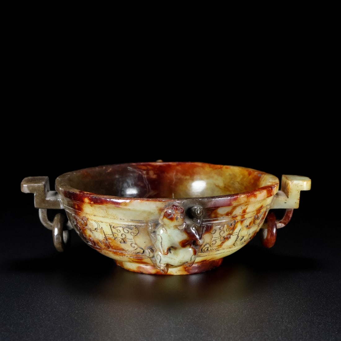 A Exquisite Hotan Jade Double-Ears Bowl: A Exquisite Hotan Jade Double-Ears Bowl,Han Dynasty, China,Size:5.9inx5.5inx2in ,Weight:279.6g 和田玉双耳碗,中国汉代