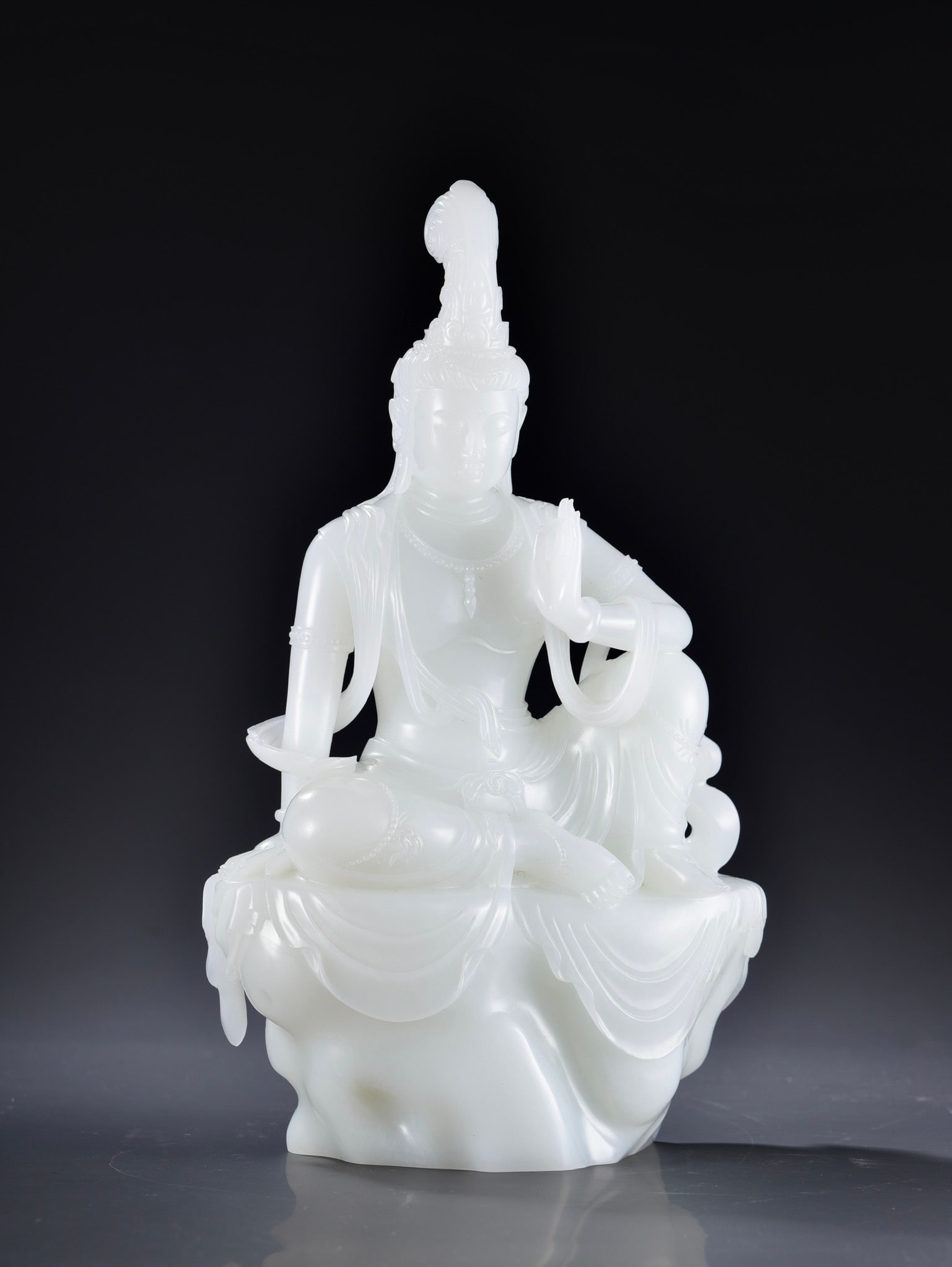 A Exquisite Hotan White Jade Avalokitesvara Ornament: A Exquisite Hotan White Jade Avalokitesvara Ornament,Qing Dynasty, China,Size:9.3inx5.5inx2.3in,Weight:1751.5g 和田白玉观音摆件,中国清