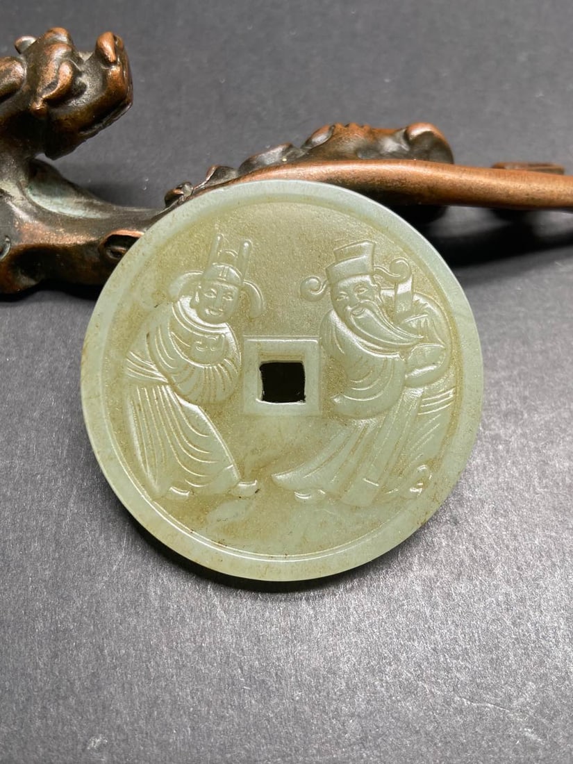 A Exquisite Hotan Jade Figures Pattern pendant: A Exquisite Hotan Jade Figures Pattern pendant,Ming Dynasty, China,Size:1.9inx1.9inx0.2in ,Weight:25g 和田玉人物纹玉佩,中国明代