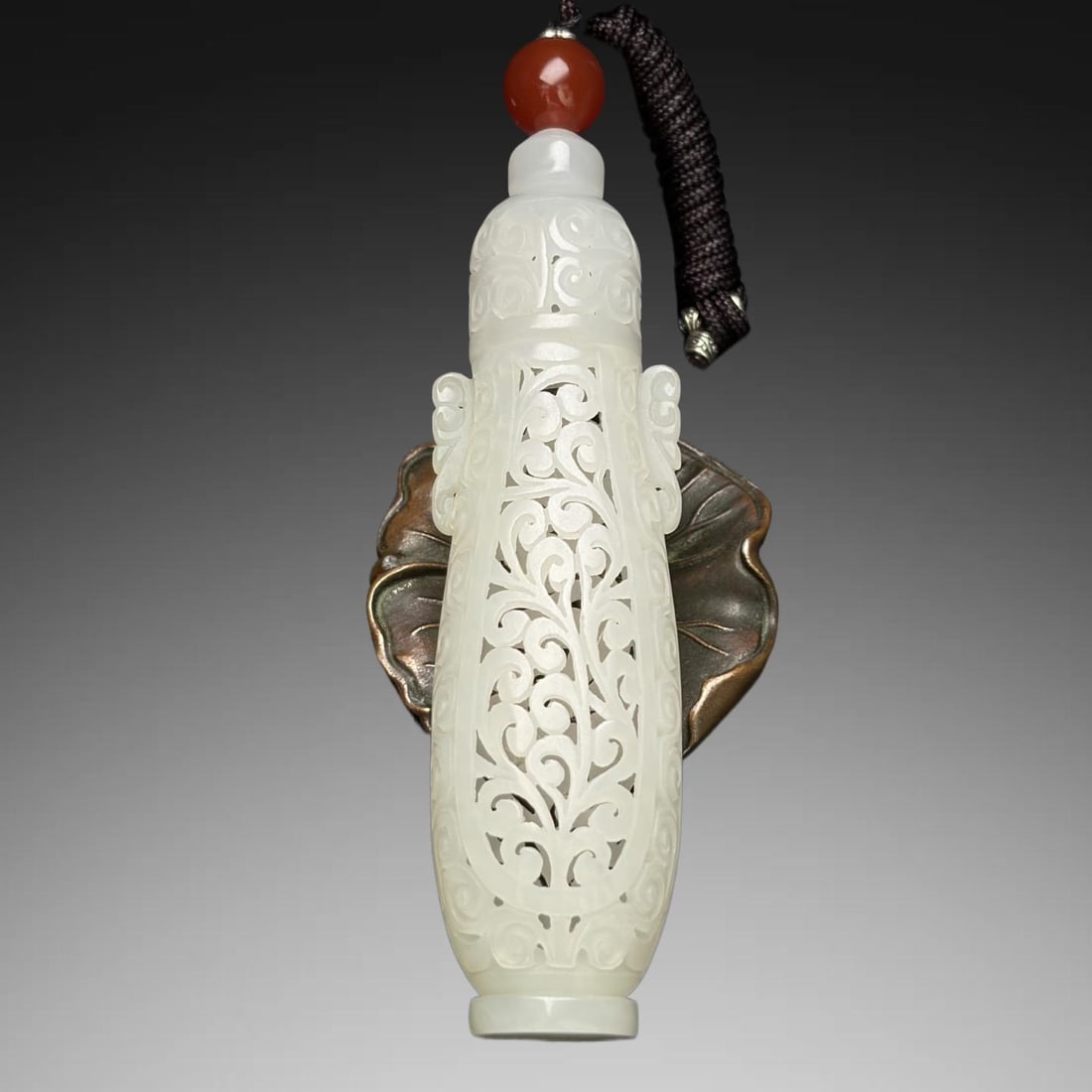 A Exquisite Hotan White Jade Double-Ears Sachet: A Exquisite Hotan White Jade Double-Ears Sachet,Qing Dynasty, China,Size:4inx1.1inx0.9in, Weight:44g 和田白玉双耳香囊,中国清代