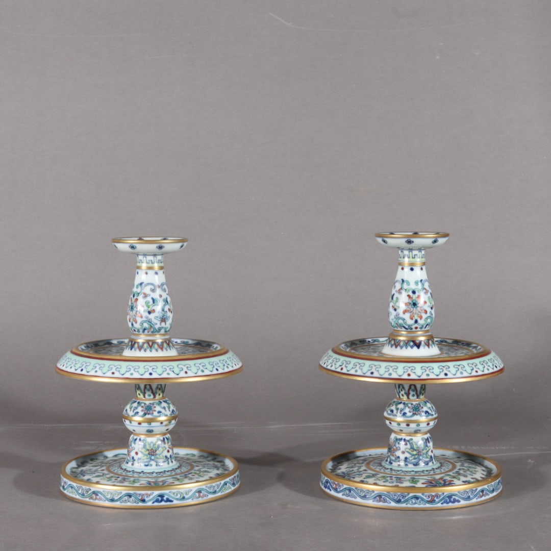 A pair of Exquisite Doucai Flower Pattern Candlestick: A pair of Exquisite Doucai Flower Pattern Candlestick,Qing Dynasty, China,Qianlong Four-character Mark,Size:6.7inx2inx4.9inx4.7in