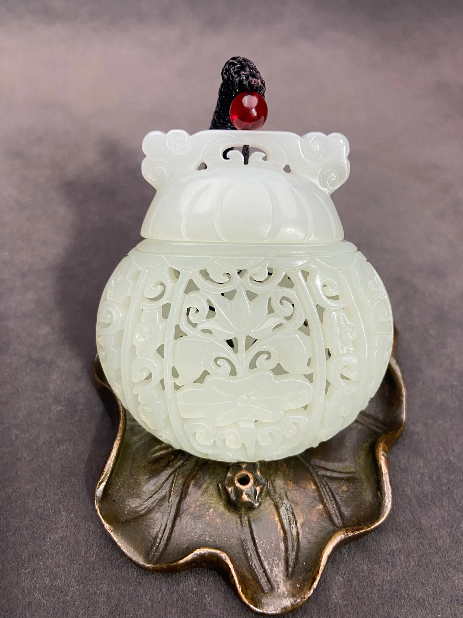 An Exquisite White Jade Hollow Lotus Pattern Pendant: An Exquisite White Jade Hollow Lotus Pattern Pendant,Qing Dynasty,China,Size:56.5mmx50.6mmx16.5mm,Weight:39g 白玉镂空莲花纹挂件,中国&#
