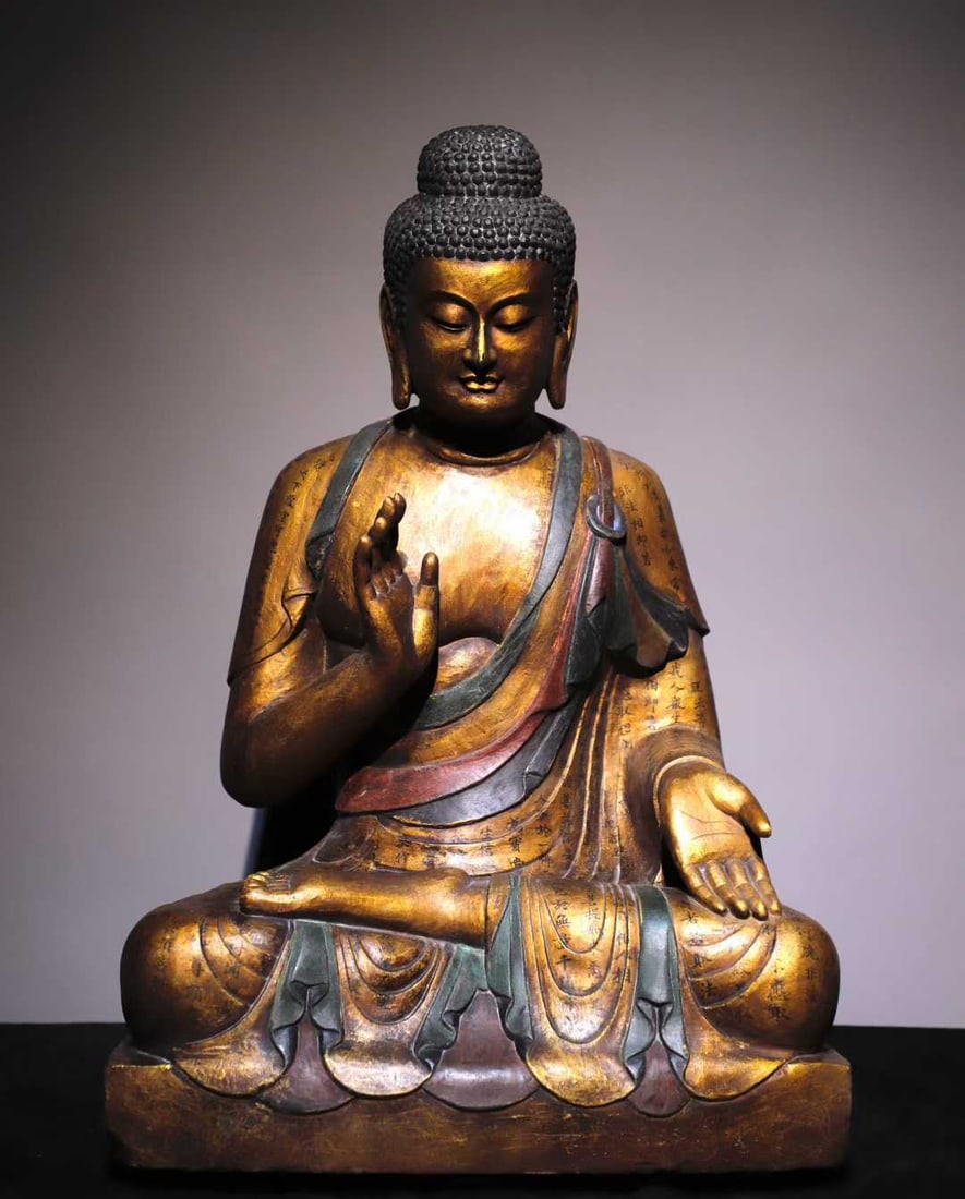 A Solemn Limestone Gilt Painted Color Statue of Sakyamuni,With Scriptures: A Solemn Limestone Gilt Painted Color Statue of Sakyamuni,With Scriptures,Tang Dynasty,China,Size:26.8inx18.1inx13.8in 青石鎏金彩绘释迦摩尼&