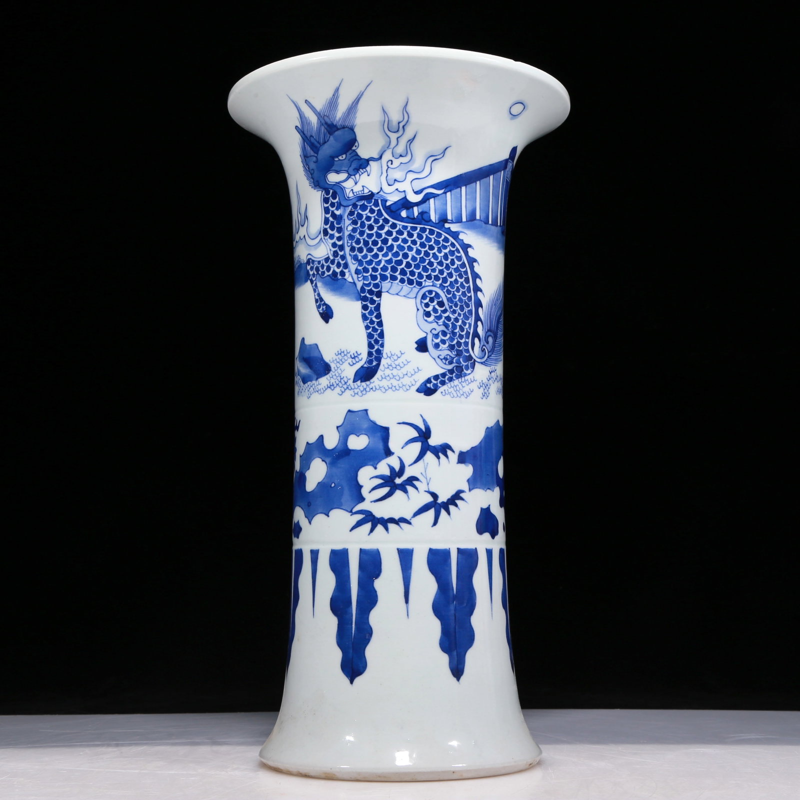 A Fabulous Blue And White 'Kylin' Vase: A Fabulous Blue And White 'Kylin' Vase. Potted with a flaring top, body painted in deep cobalt blue with a scaly kylin. Chinese Qing Dynasty. Size:7.7inx14.6in. Weight:3210g. 清代 青