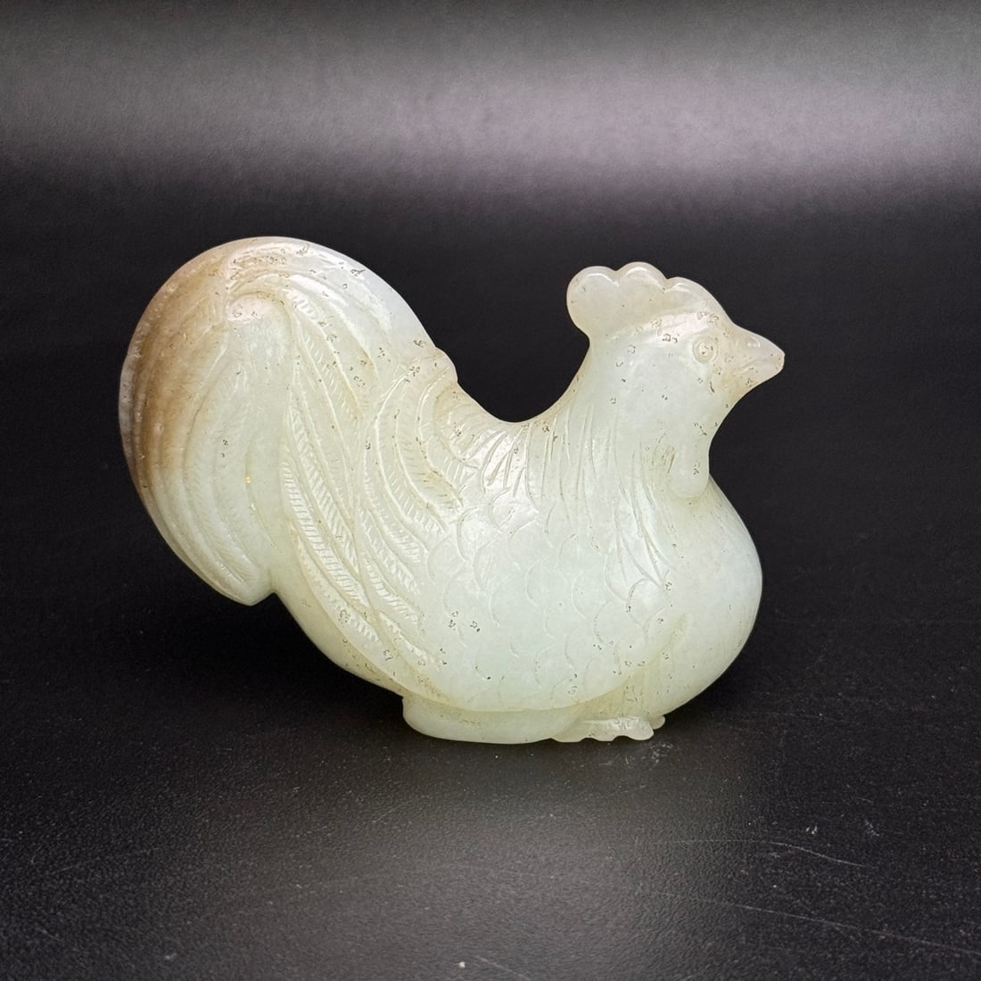 An Exquisite White Jade Rooster Ornament (1 of 7)