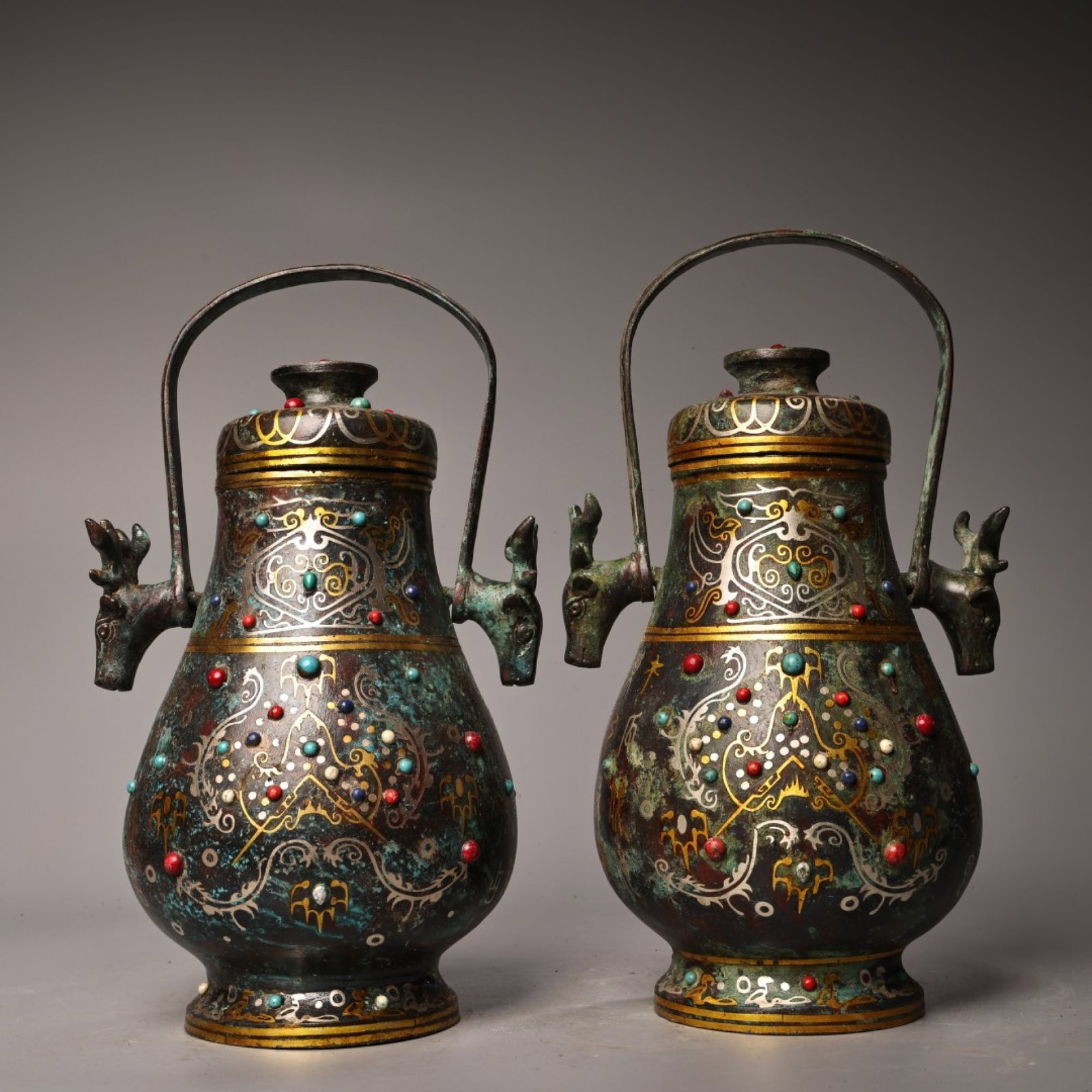 A Pair of Exquisite Bronze Inlaid Gold and Silver Beast Pattern Deer-Ears Jars with Cover,Inlaid: A Pair of Exquisite Bronze Inlaid Gold and Silver Beast Pattern Deer-Ears Jars with Cover,Inlaid Gems,With Inscription,the Warring States period in China,Size:10.6inx6.7in,Weight:2100g 一对