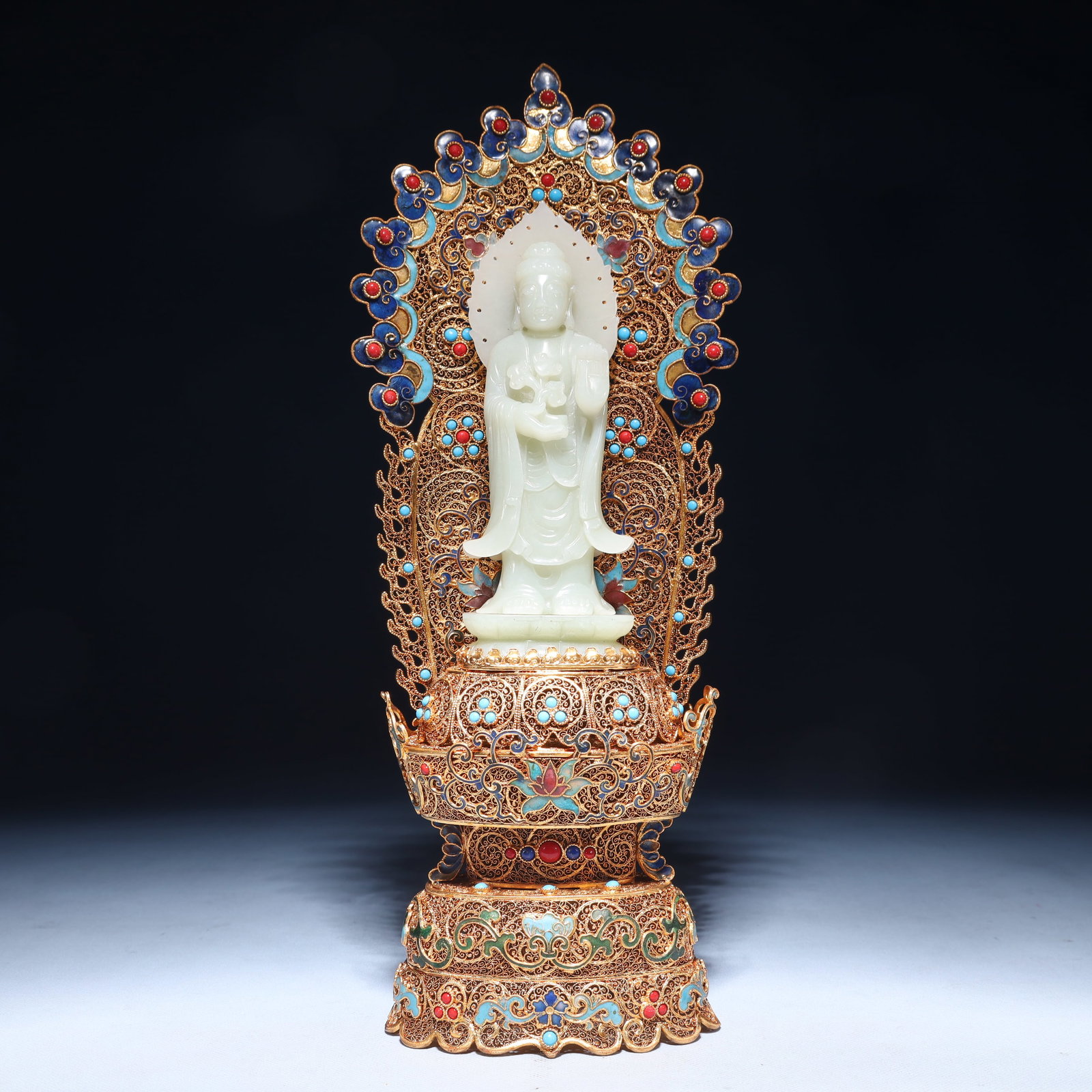 An Exquisite Filigree and Gilding Inlaid White Jade Buddha Statue, Inlaid Gems: An Exquisite Filigree and Gilding Inlaid White Jade Buddha Statue, Inlaid Gems, Qing Dynasty,China, Qianlong Four-character Mark, Size:4.7inx3.1inx14.6in,Weight:1150g